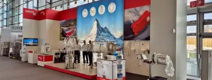 Booth at ACHEMA with Lugaia employees